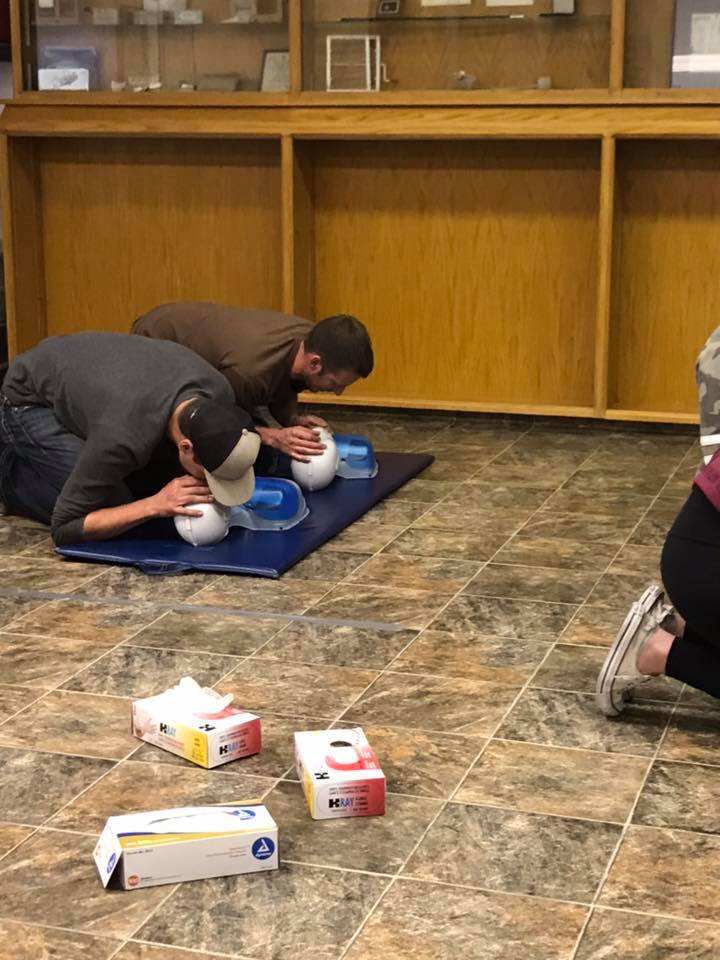 photo of Schultz Electric electricians learning artificial respiration