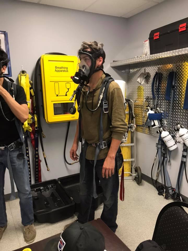 photo of Schultz Electric electricians training to use breathing aparatus